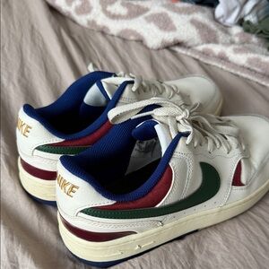 Nike White and Green Sneakers with Red and Blue Accents